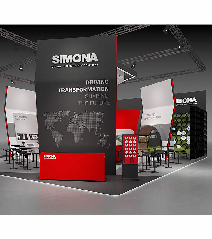 SIMONA Messestand in Schwarz und Rot mit Weltkarte und Slogan ‚Driving Transformation – Shaping the Future